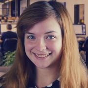 Smiling young woman with brown hair